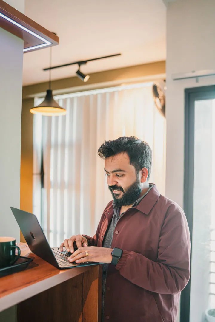 Engineering huddle around whiteboard sketches