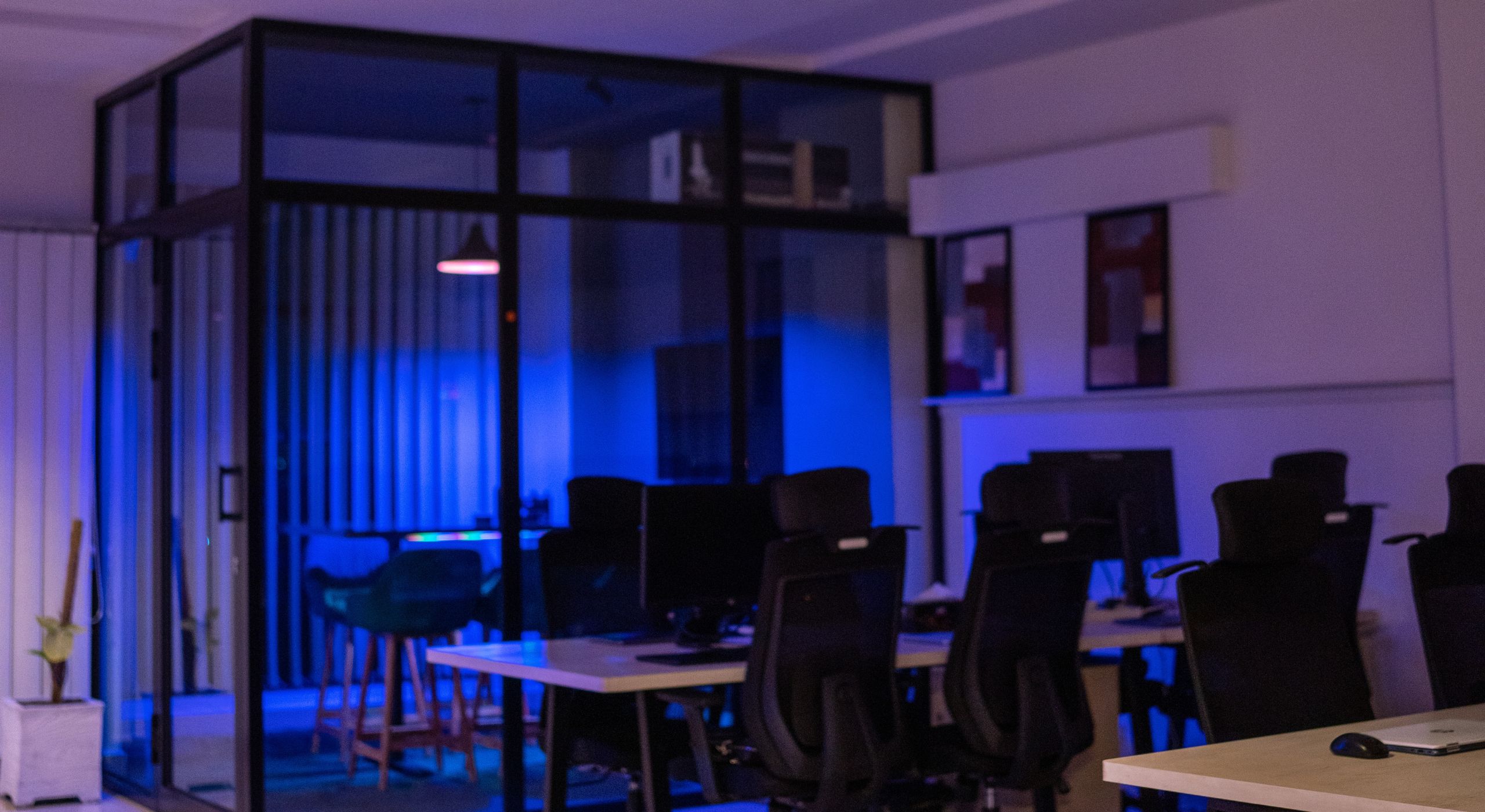 Man working on a laptop on a sofa