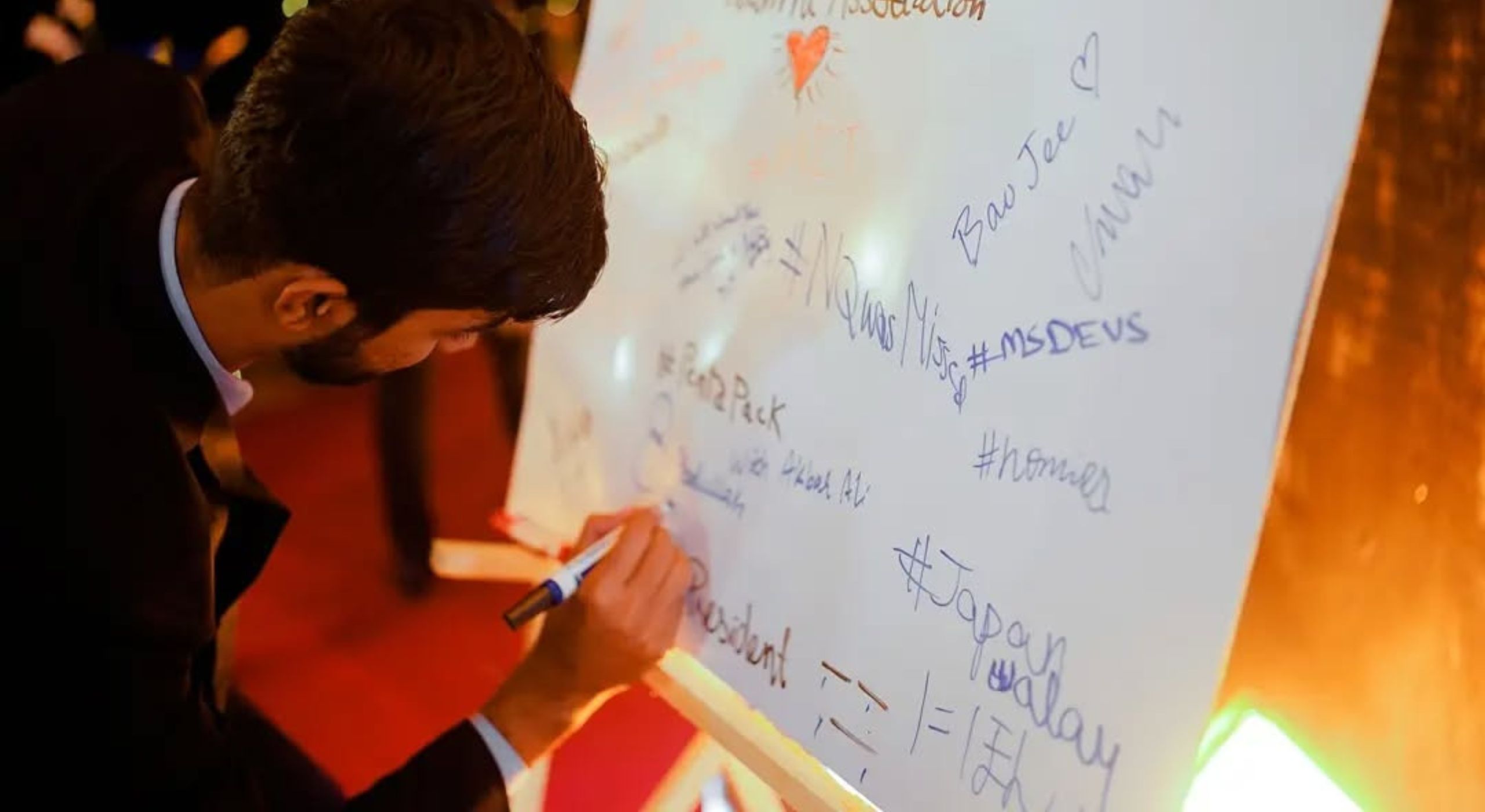 Person working on a laptop in the office